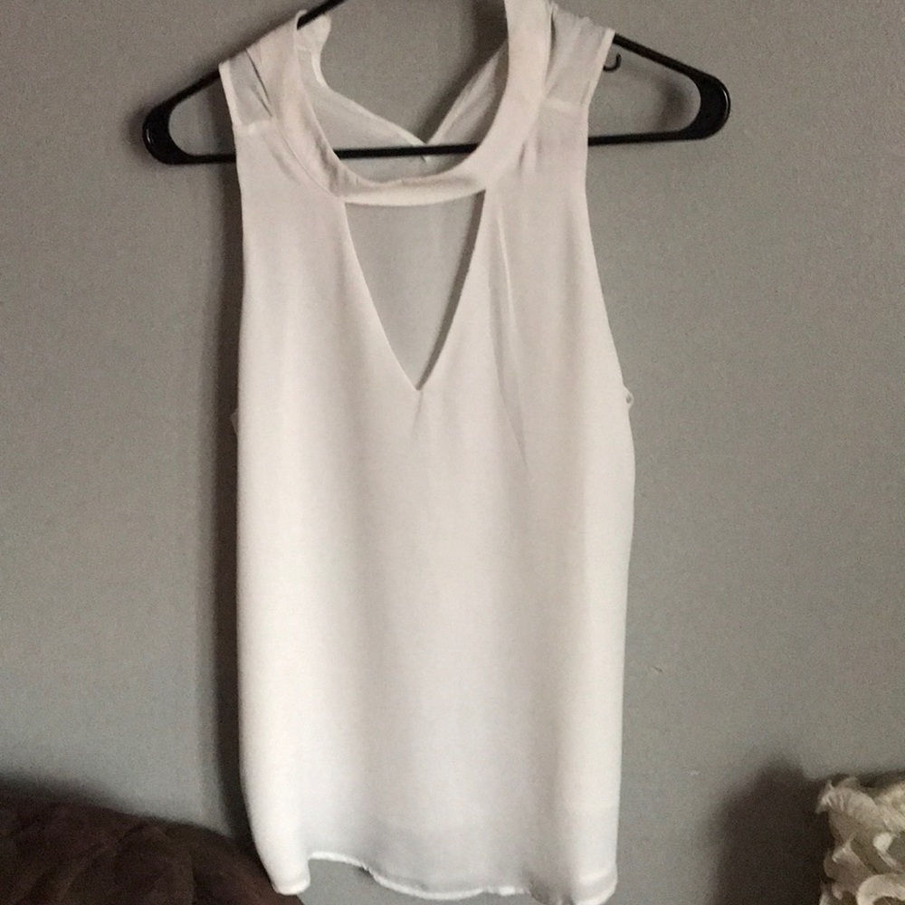 Sleeveless off white blouse